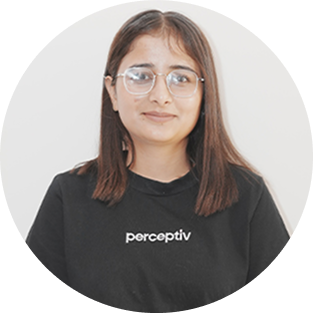 Taranpreet Kaur, PPC and SEO Strategist at Perceptiv Media, wearing a branded black shirt, smiling, showcasing the team’s commitment to digital marketing excellence.