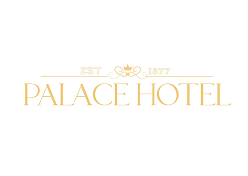 Palace Hotel logo featuring elegant typography and crown emblem, symbolizing luxury and heritage since 1877.